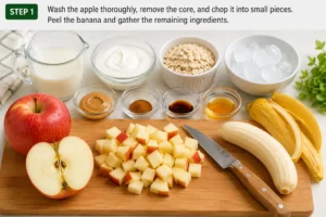 Wash and chop fresh apple, peel banana, and prepare ingredients for Apple Cinnamon Smoothie recipe.